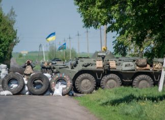 Військовий стан в Україні: як водіям їхати через блокпости